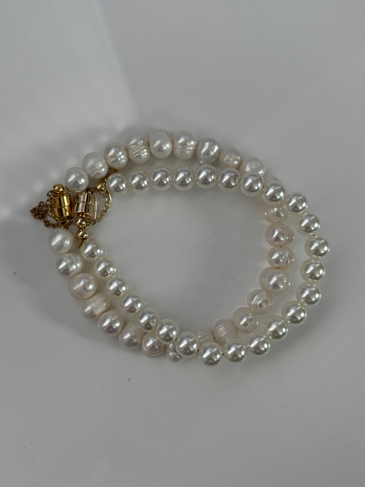 The Board Meeting: Pearl Bracelet with Gold finishings