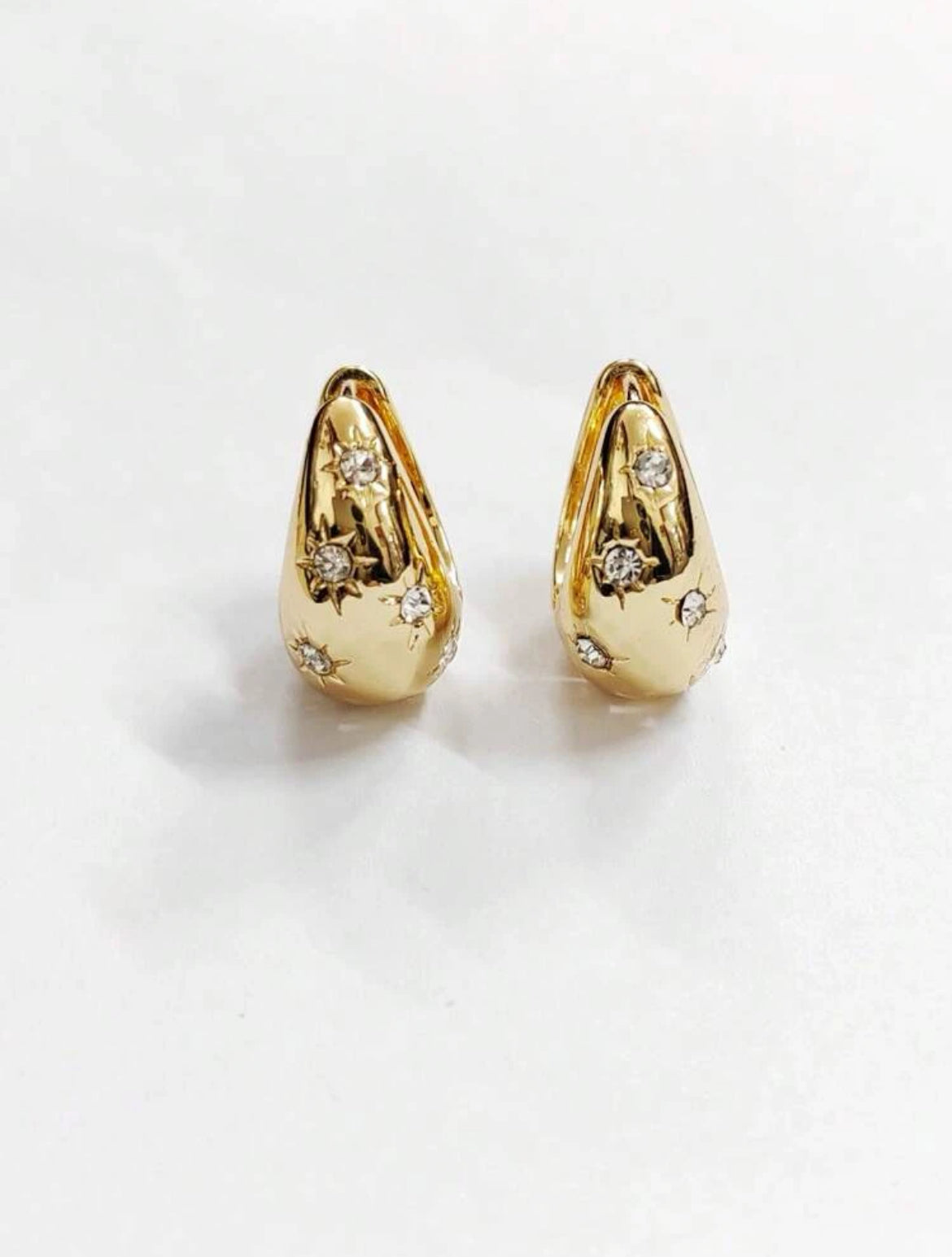 The stars: Gold earrings with stones