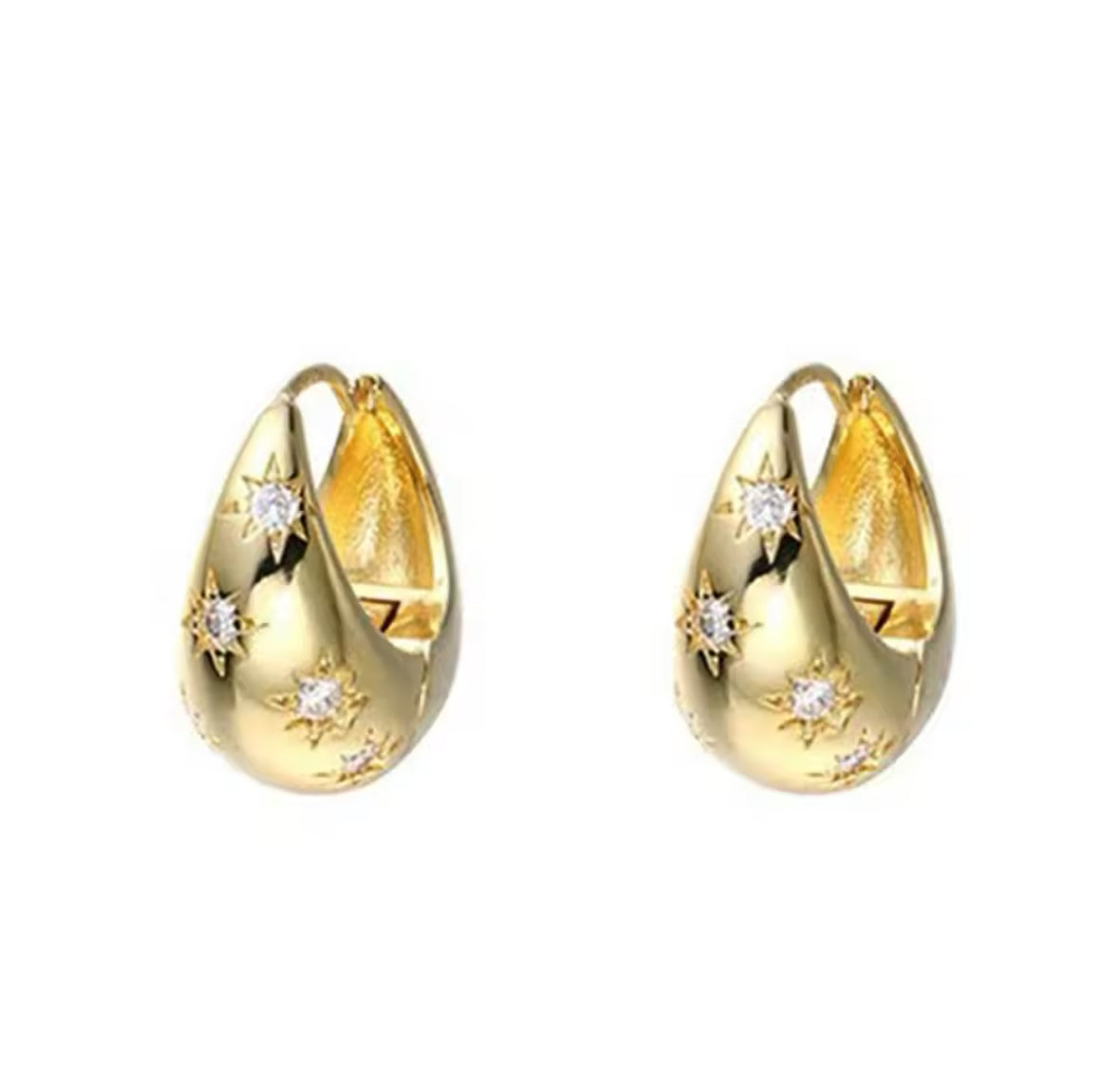 The stars: Gold earrings with stones